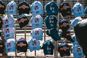 a bunch of hats that are on a rack
