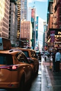 a city street filled with lots of tall buildings