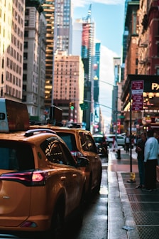 a city street filled with lots of tall buildings