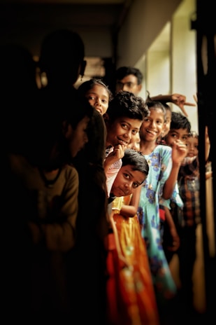 a group of children standing next to each other
