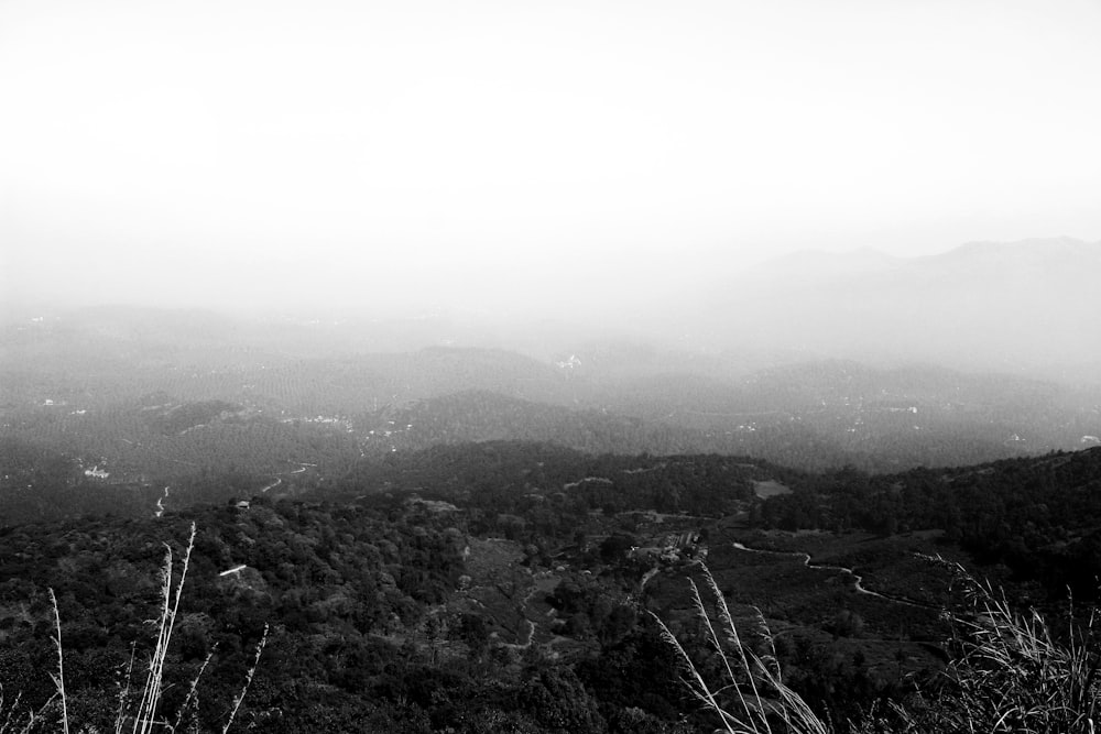 a black and white photo of a mountain range