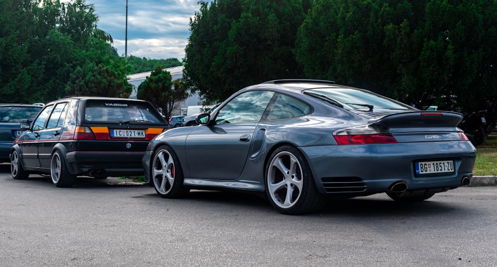 a couple of cars parked next to each other