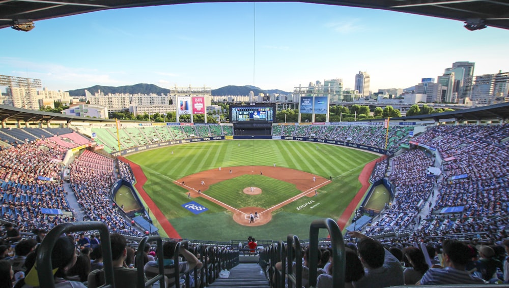 a baseball stadium filled with lots of people