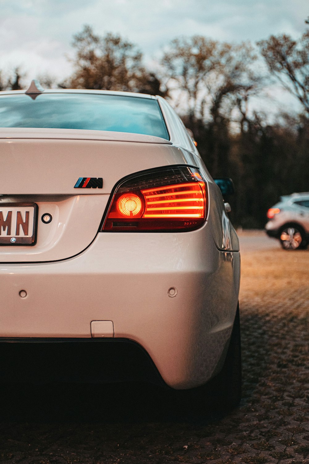 a white car parked in a parking lot