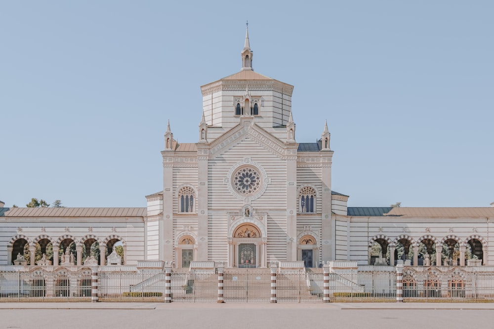 a large clock tower in front of a building