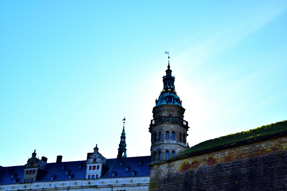 a tall building with a clock on the top of it