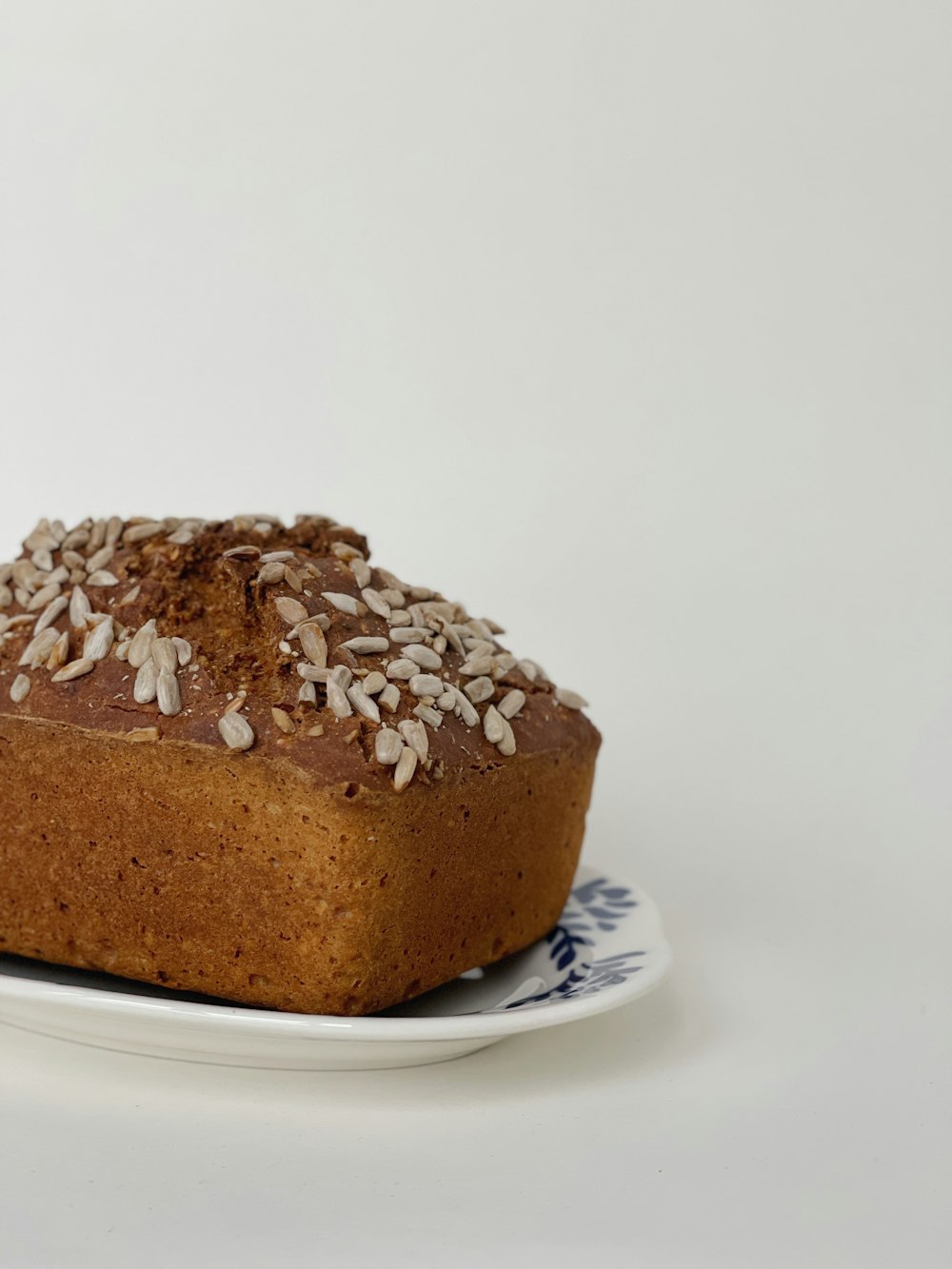 a loaf of bread sitting on top of a white plate