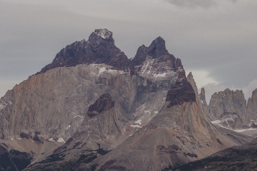 a group of mountains with snow on them