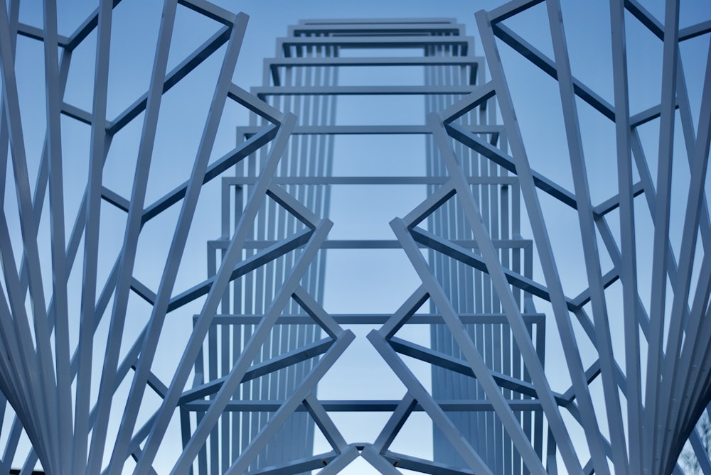 a tall metal structure with a sky in the background