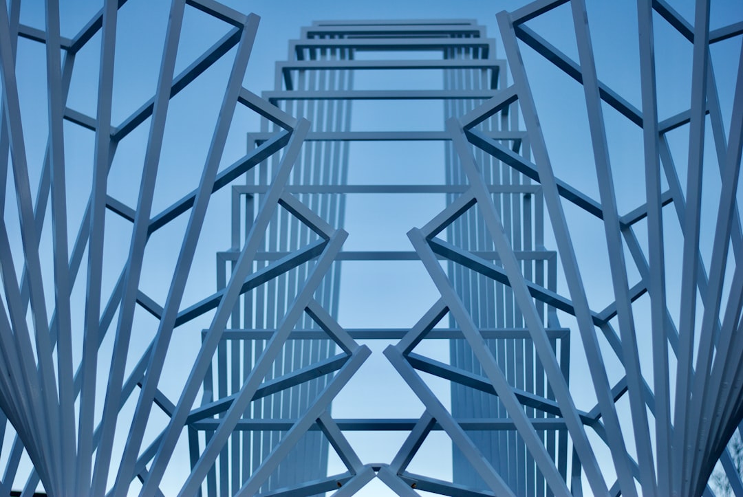 a tall metal structure with a sky in the background, Architecture