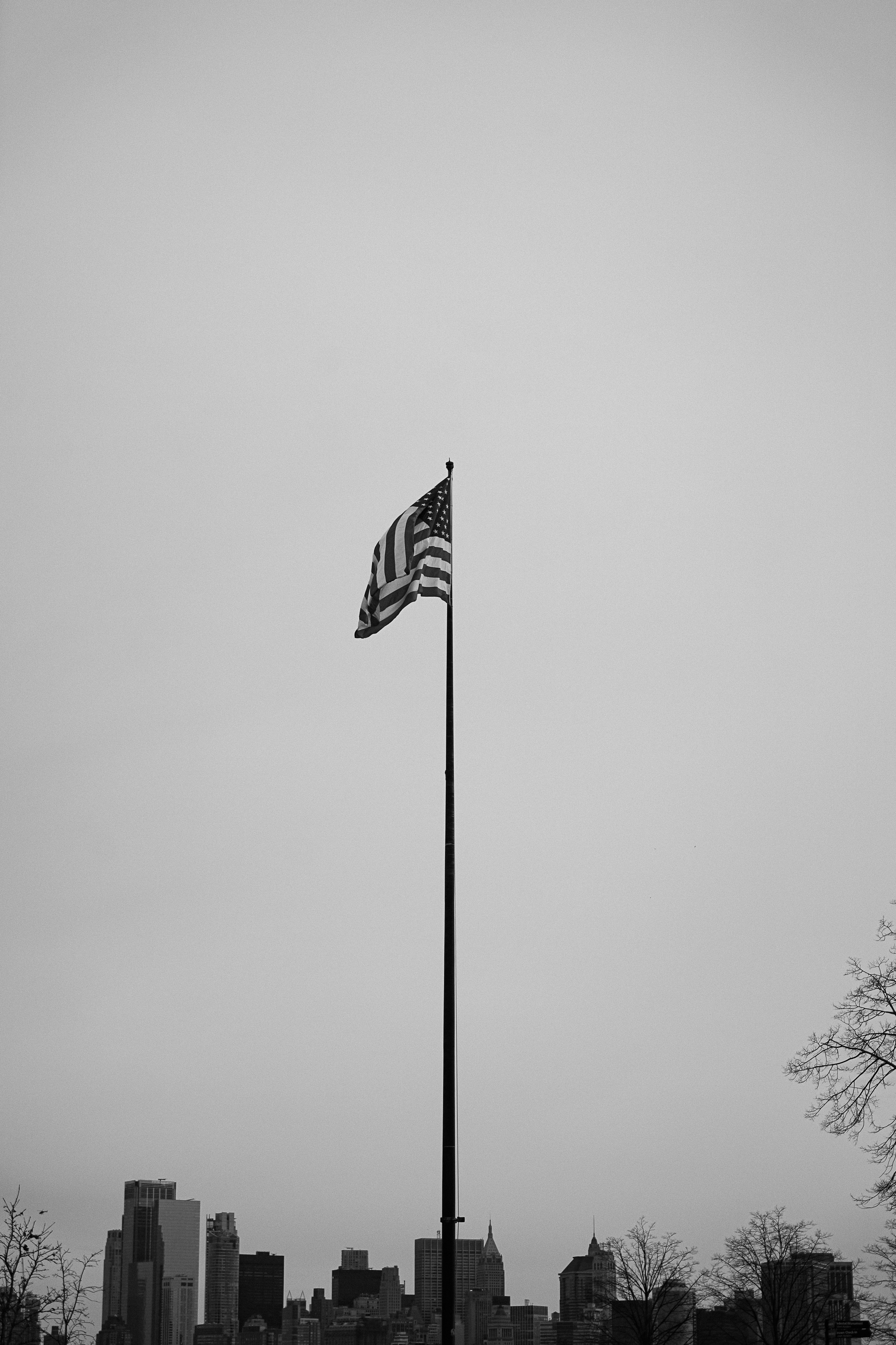 a black and white photo of an american flag