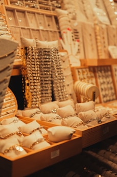 a display case filled with lots of jewelry