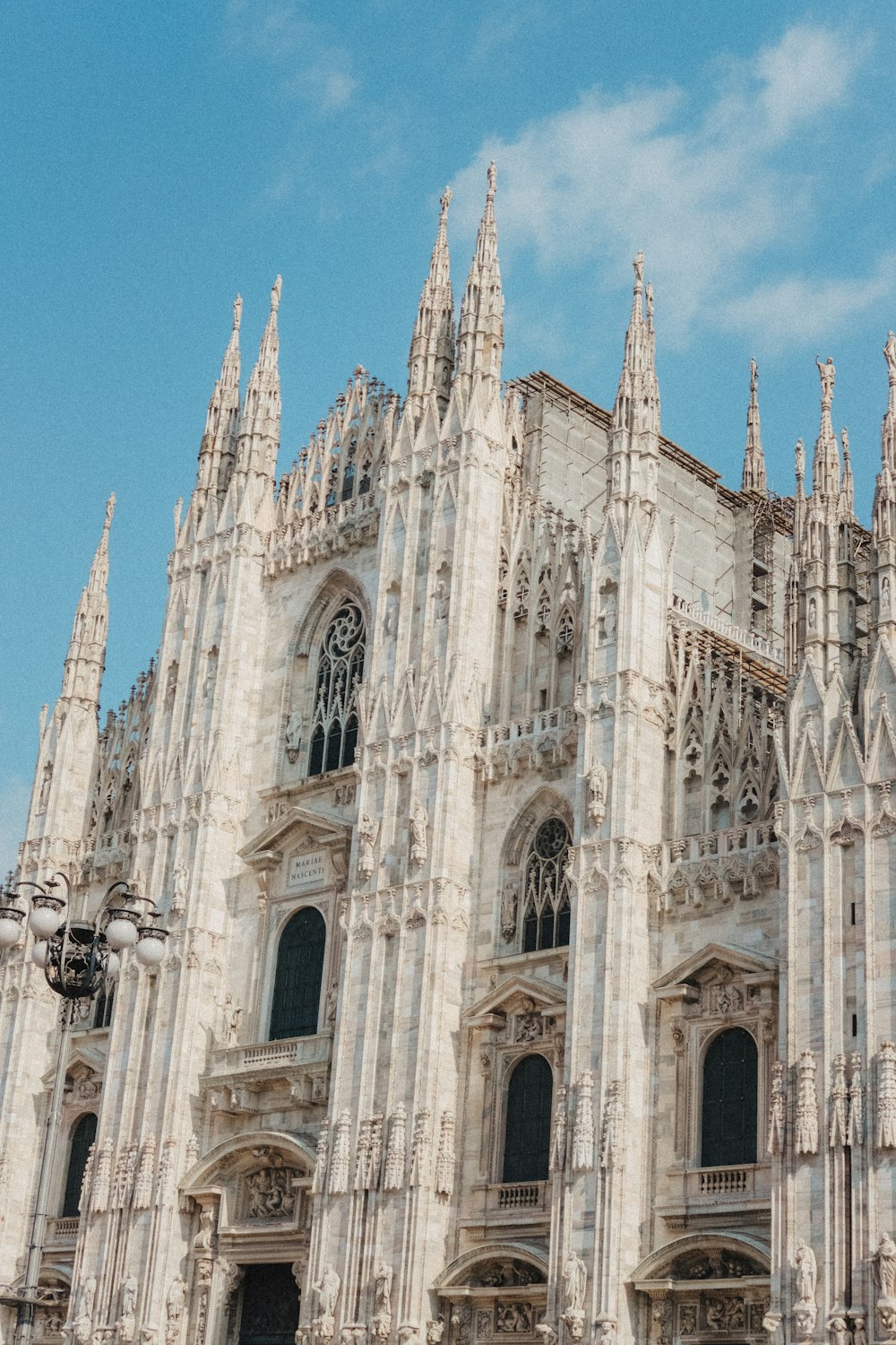 a large cathedral with a clock on the front of it