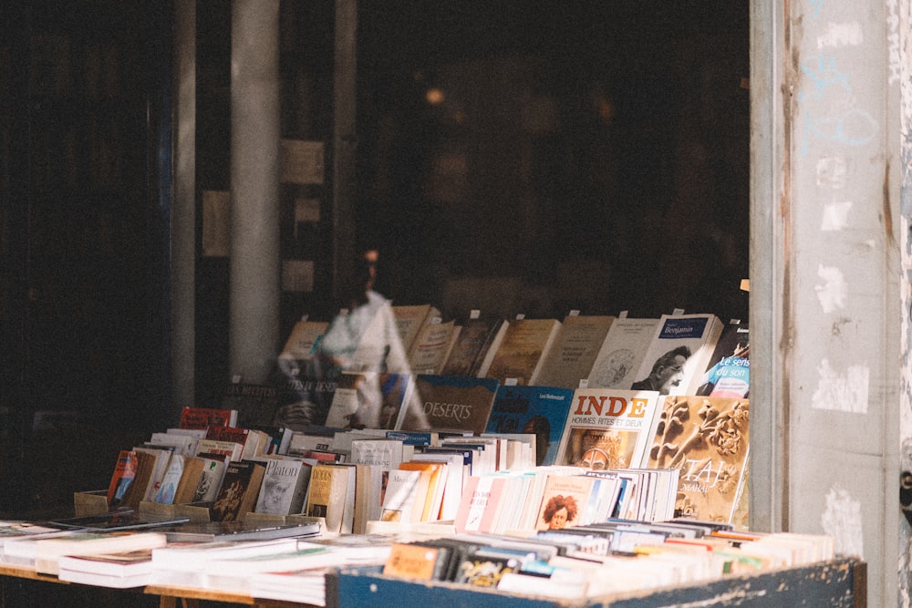 a bunch of books that are on a table