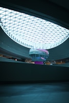 A bright skylight installation flooding a commercial lobby with sunlight.