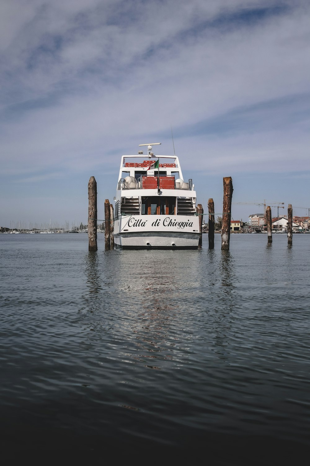 a large boat floating on top of a body of water