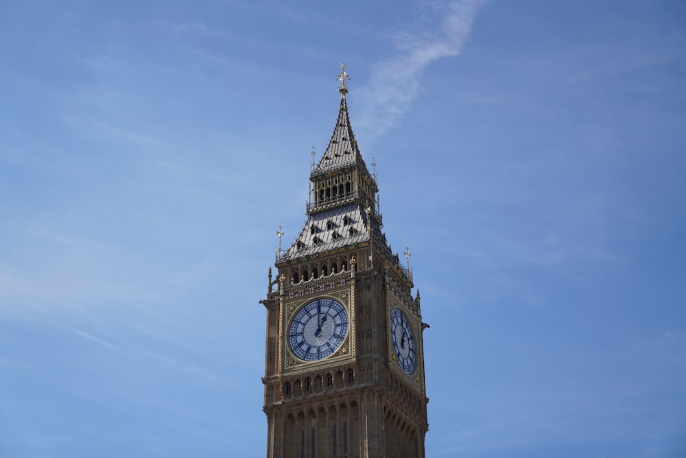 a tall clock tower with a sky background