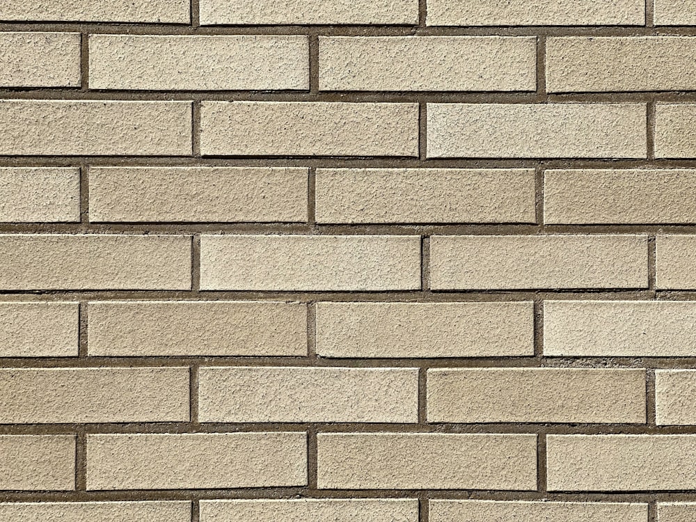 a close up of a white brick wall