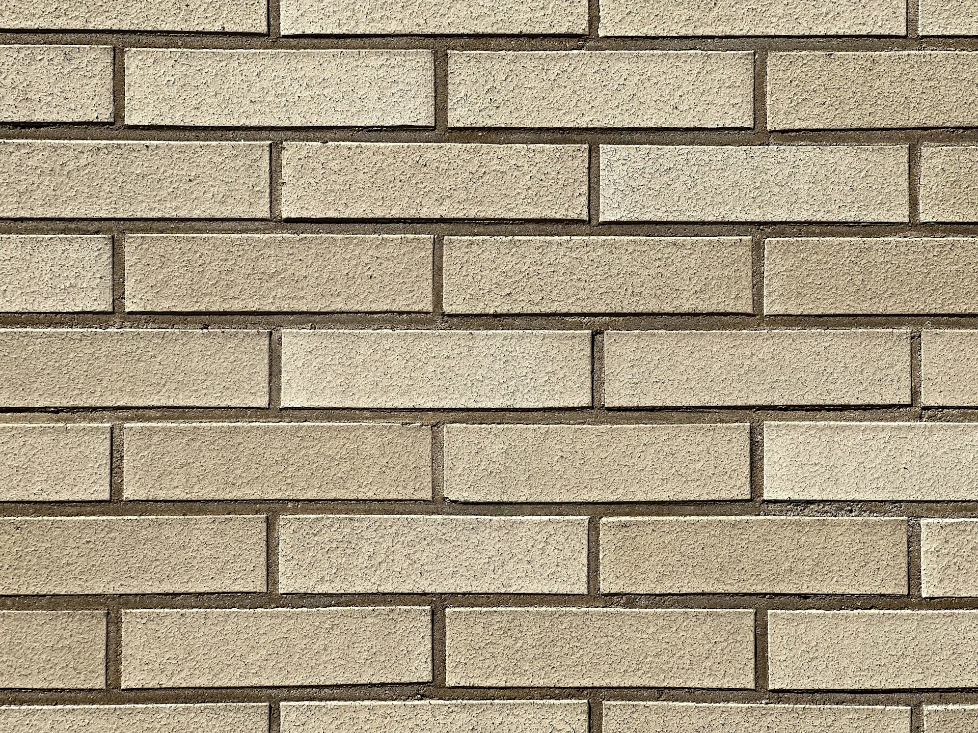 a close up of a white brick wall