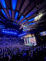 An arena-level concert with intelligent lighting design and powerful sound reinforcement.