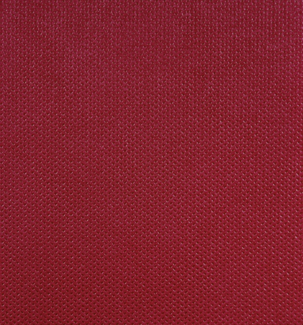 a close up of a red fabric texture