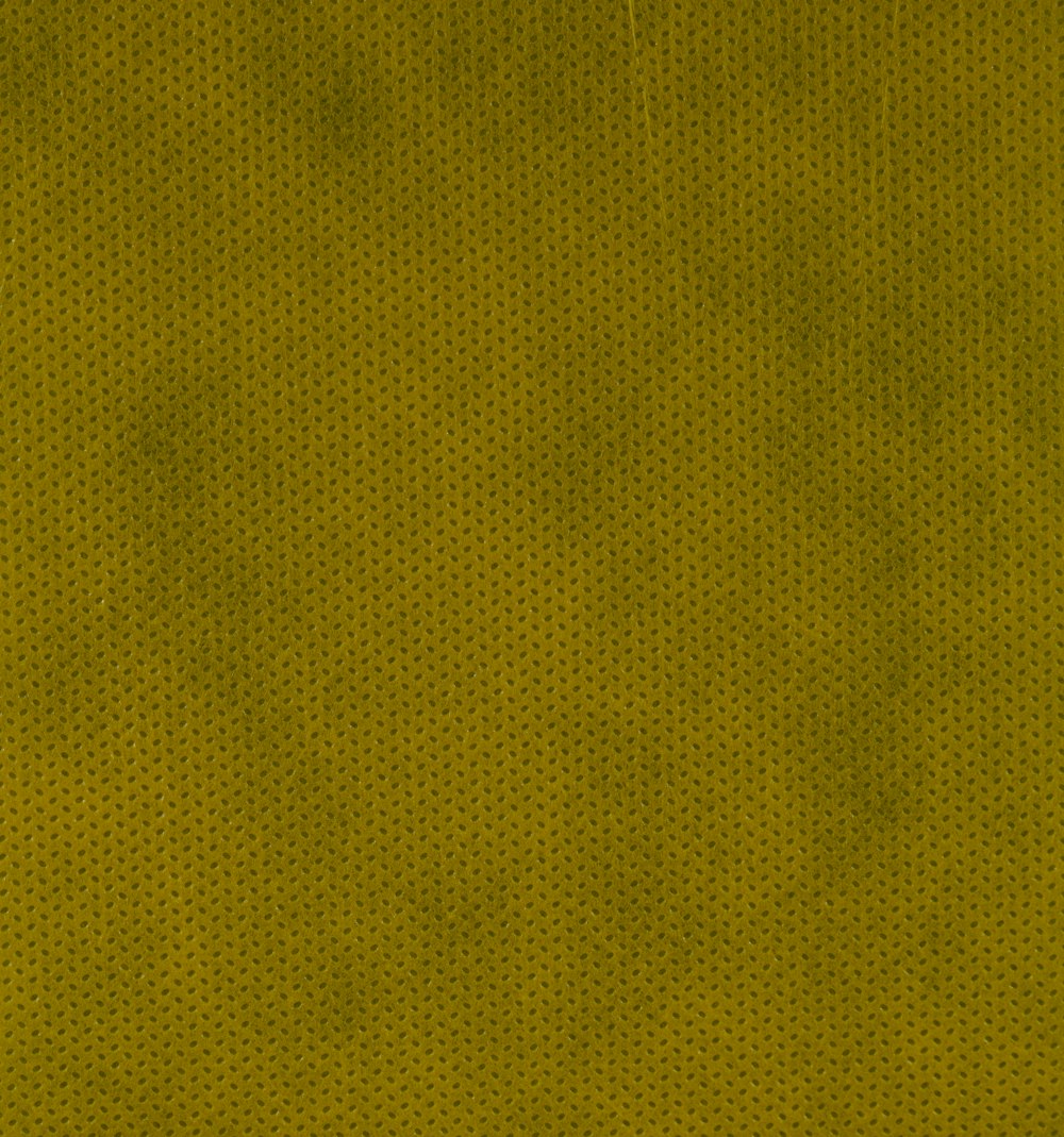 ein gelber Hintergrund mit einem Muster in der Mitte
