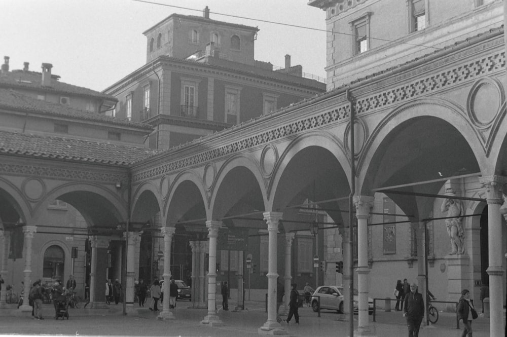 an old black and white photo of a courtyard