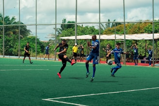 a group of young men playing a game of soccer