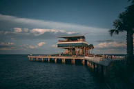 a pier with a building on top of it