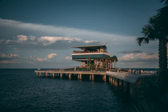 a pier with a building on top of it