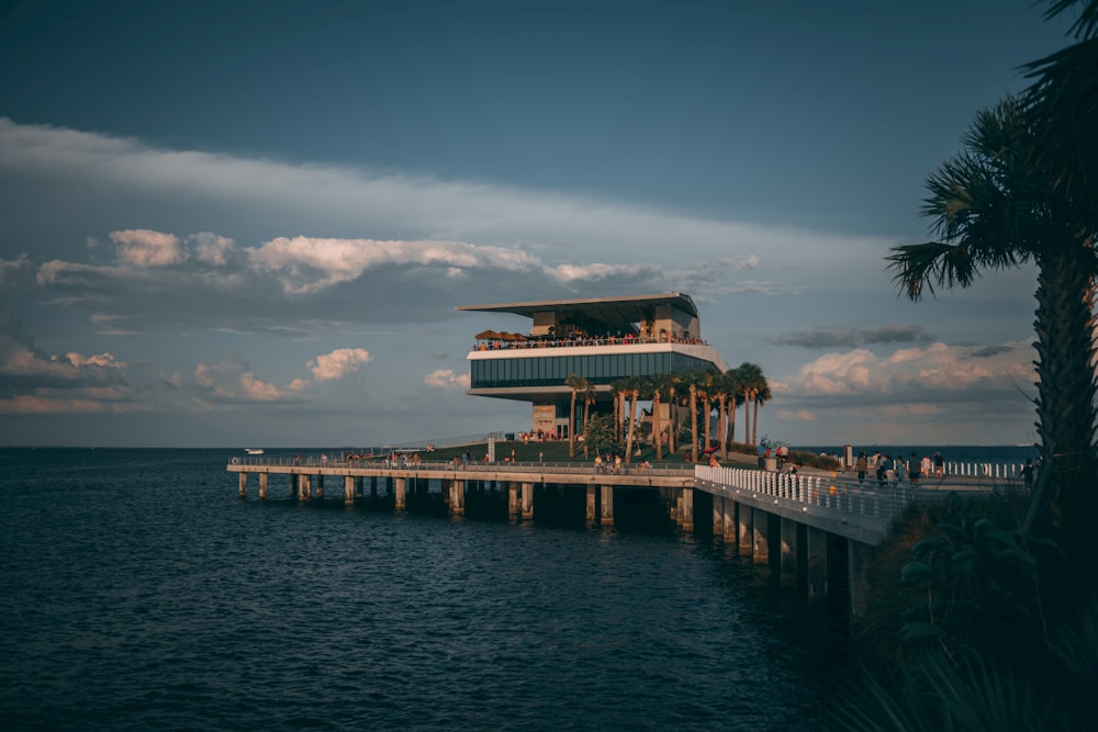 a pier with a building on top of it