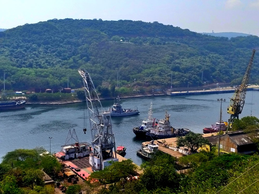 a group of boats that are sitting in the water