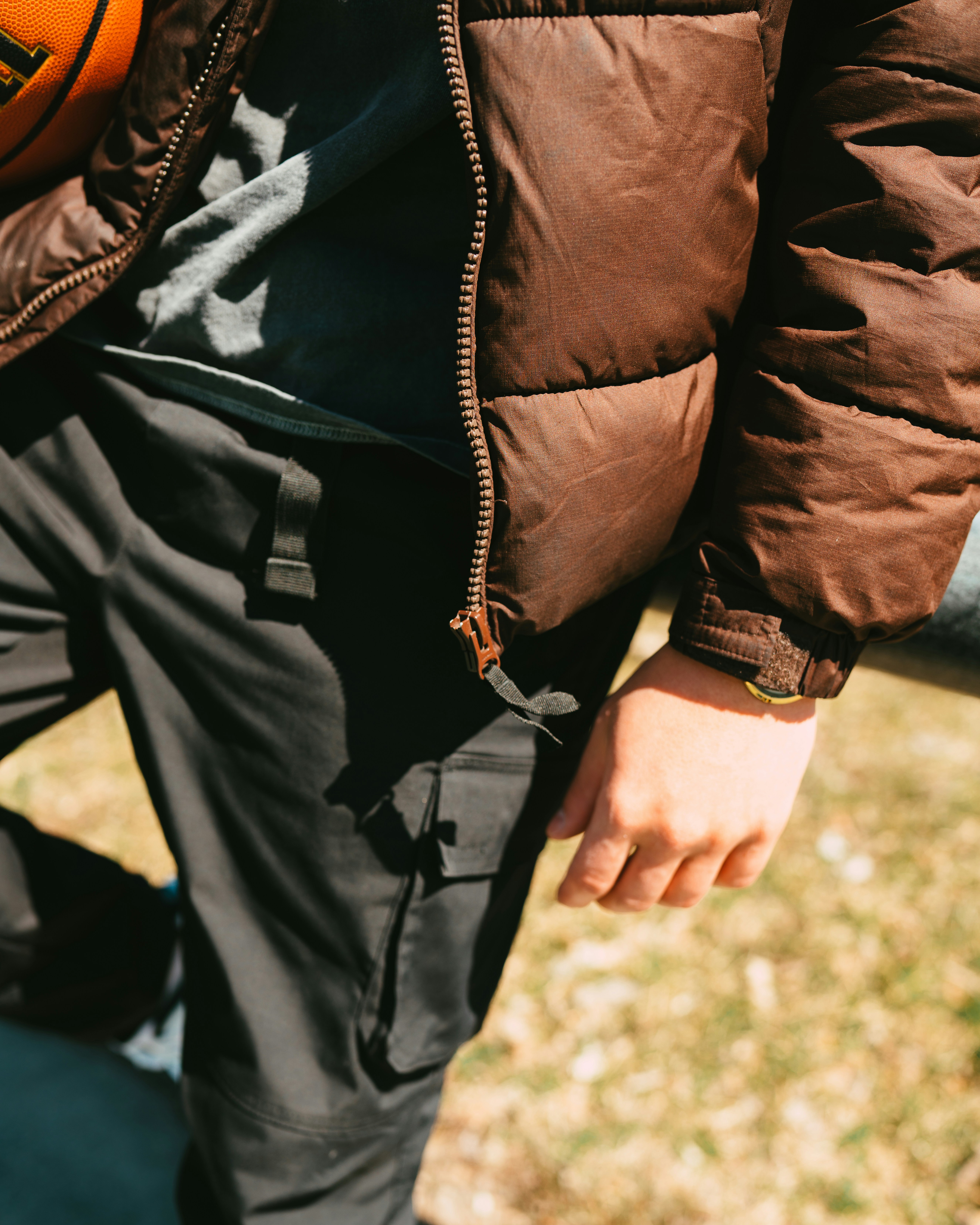 Пуховик коричневий