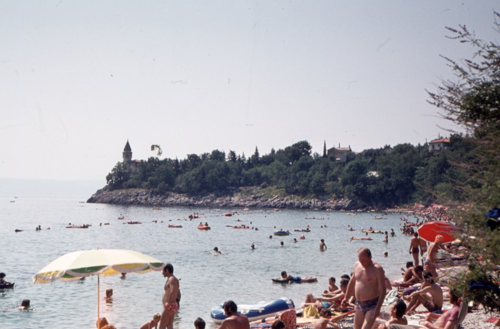 a large group of people on a beach