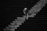 a person walking up a set of stairs