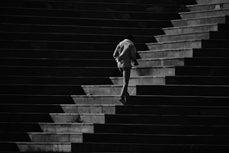 a person walking up a set of stairs