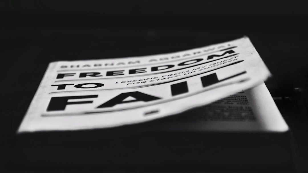 a black and white photo of a newspaper,