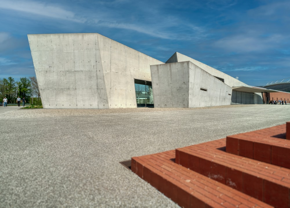 a concrete building with steps leading up to it