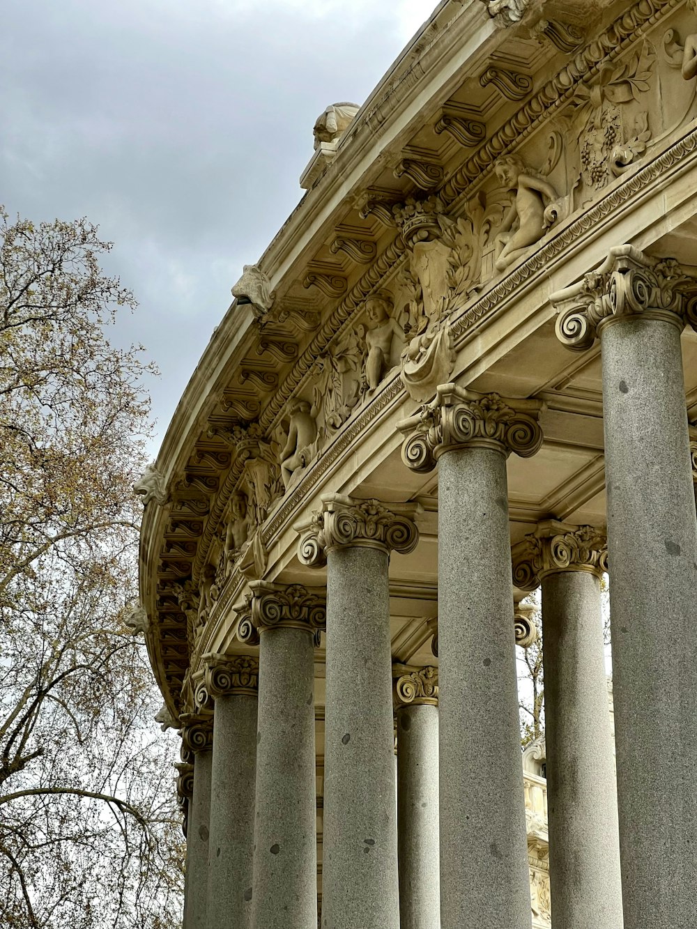 a close up of a building with many columns