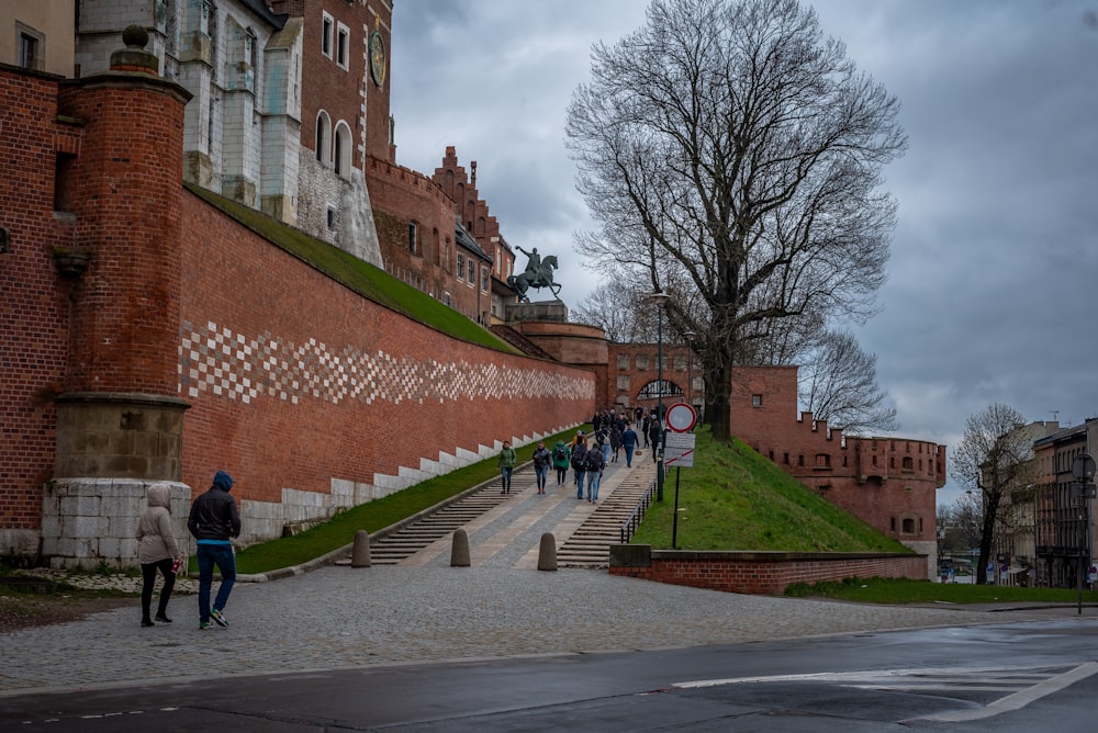 a group of people walking up and down some steps