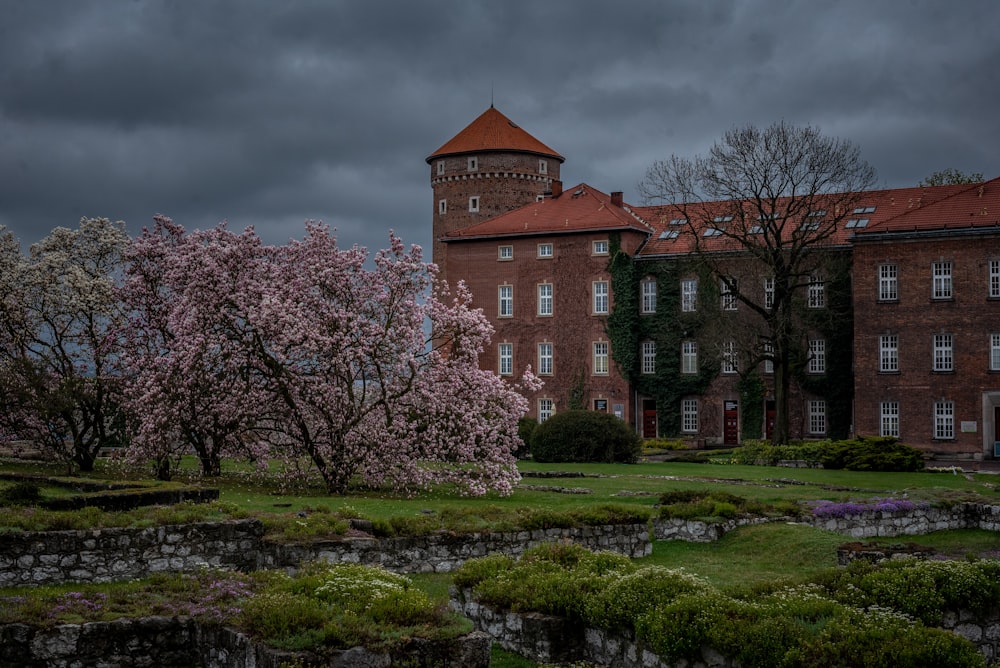 a large brick building with a tower on top of it