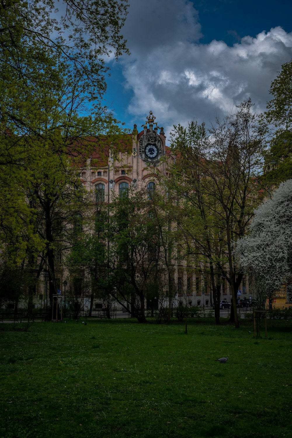 a large building with a clock on the side of it