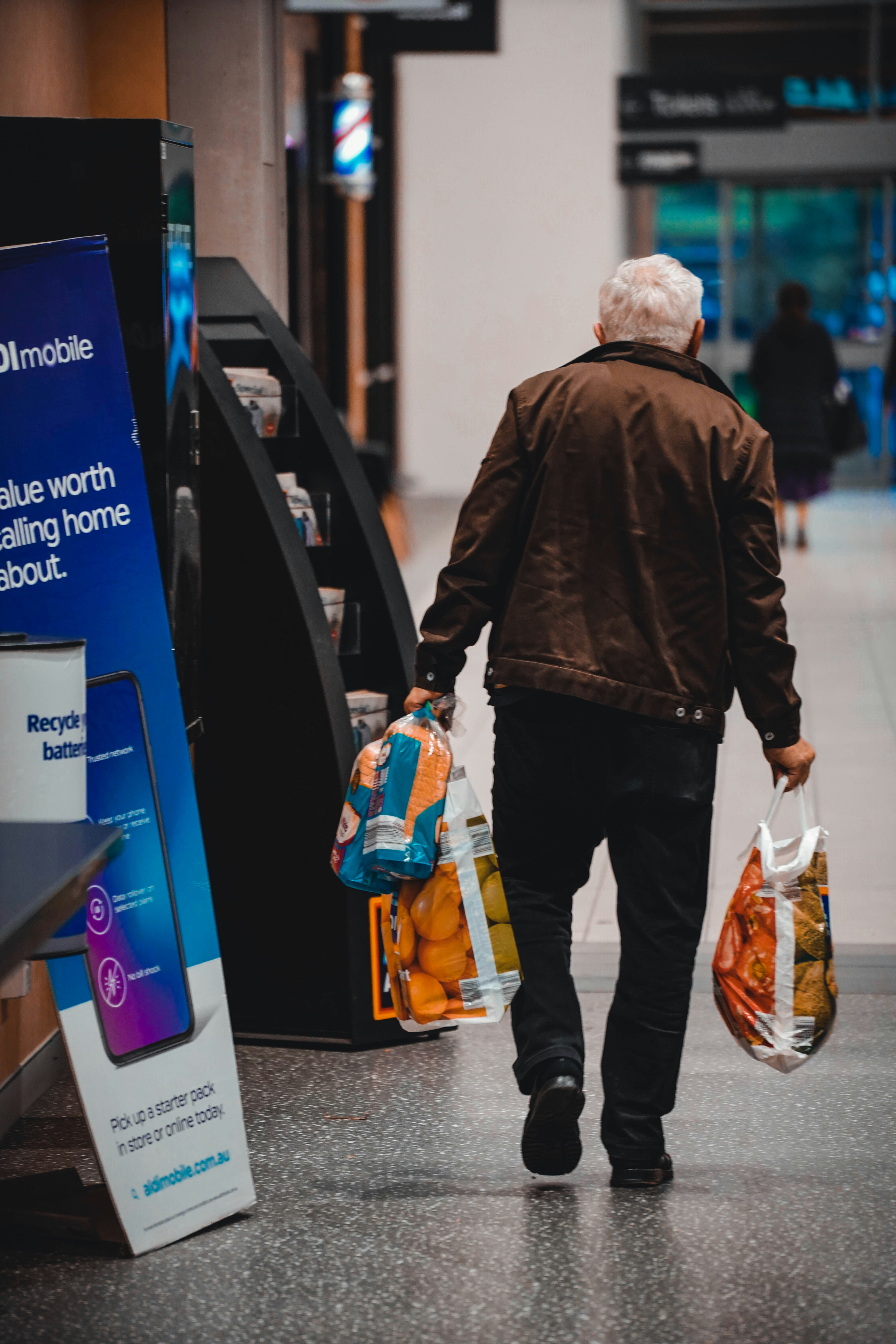 guy holding groceries