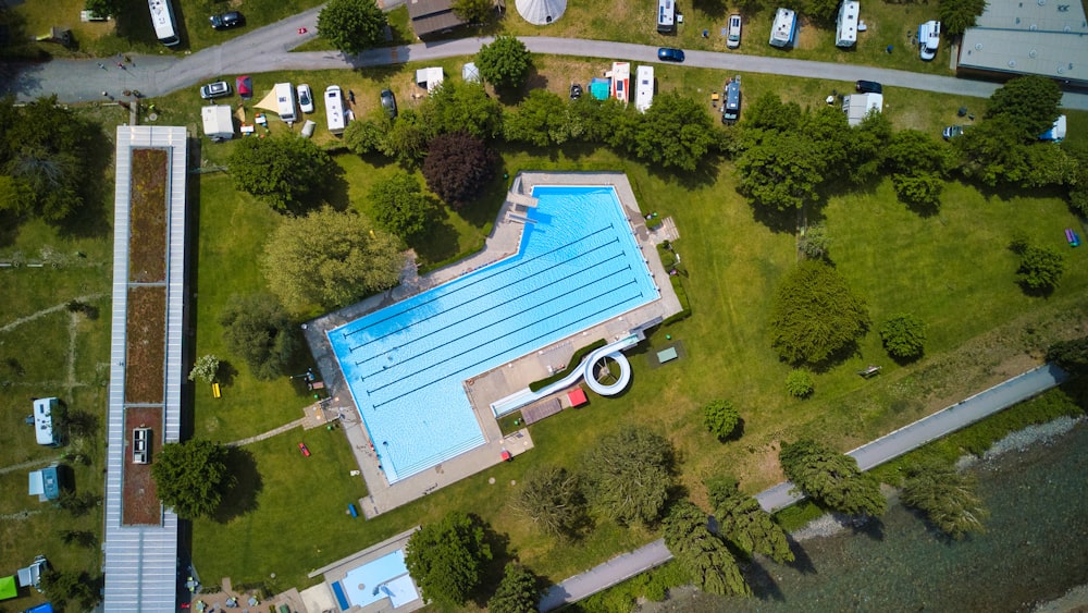 an aerial view of an outdoor swimming pool