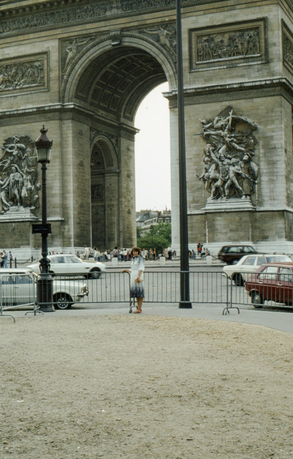 a man is standing in front of a gate