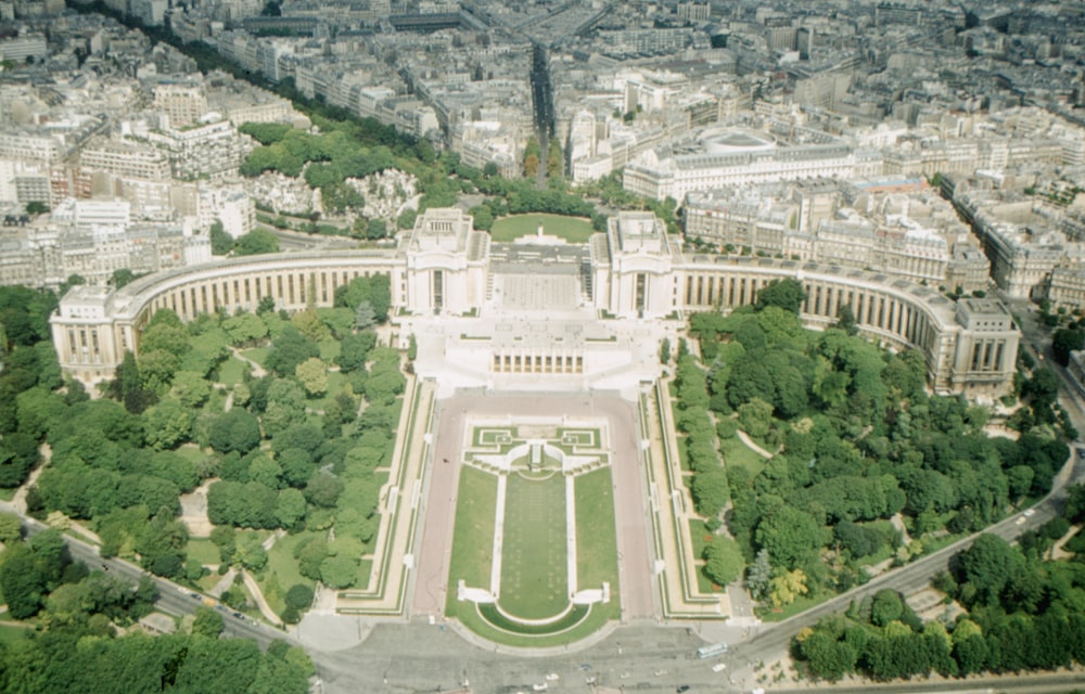 an aerial view of a city with a lot of trees