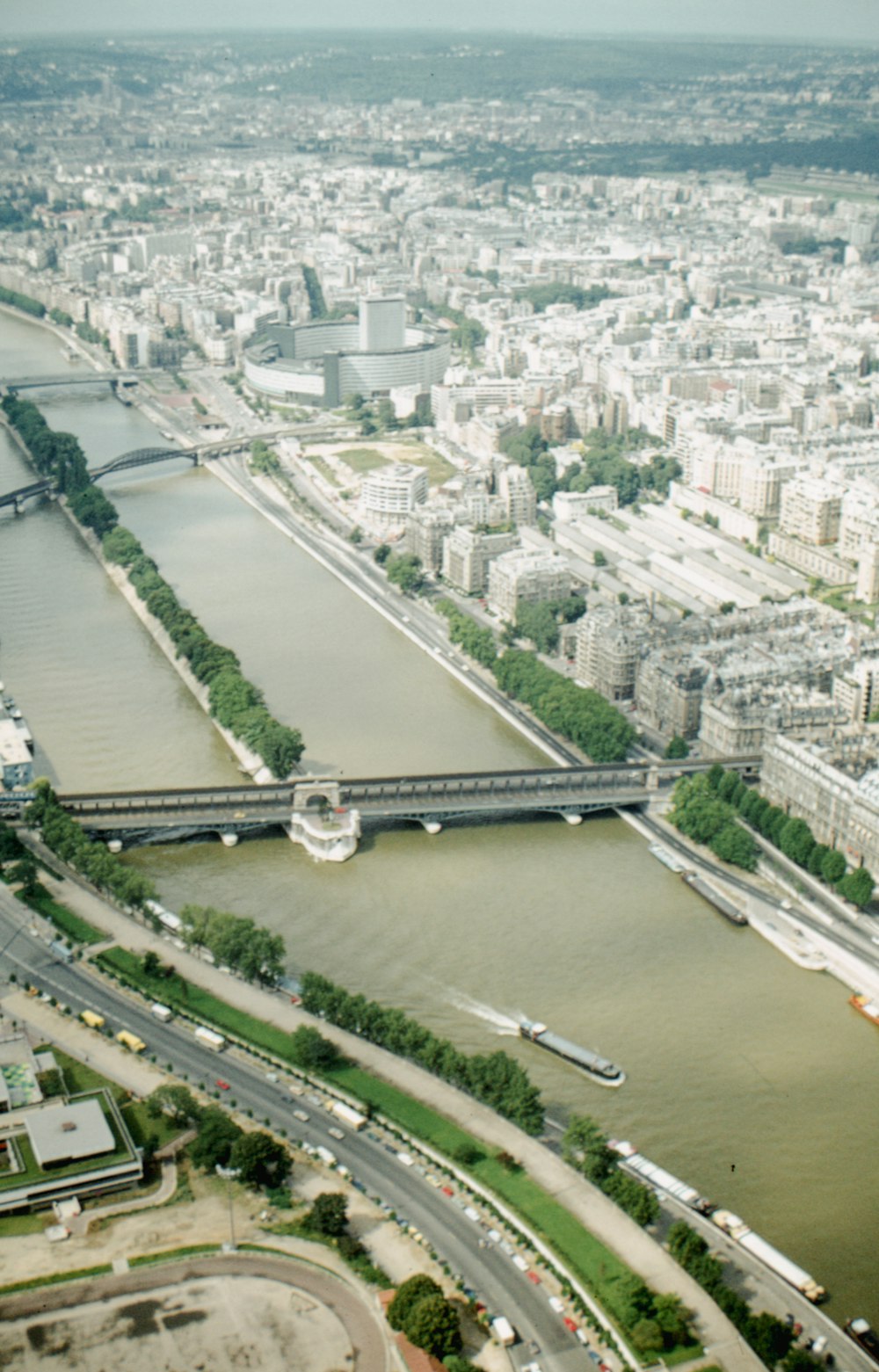 an aerial view of a city and a river