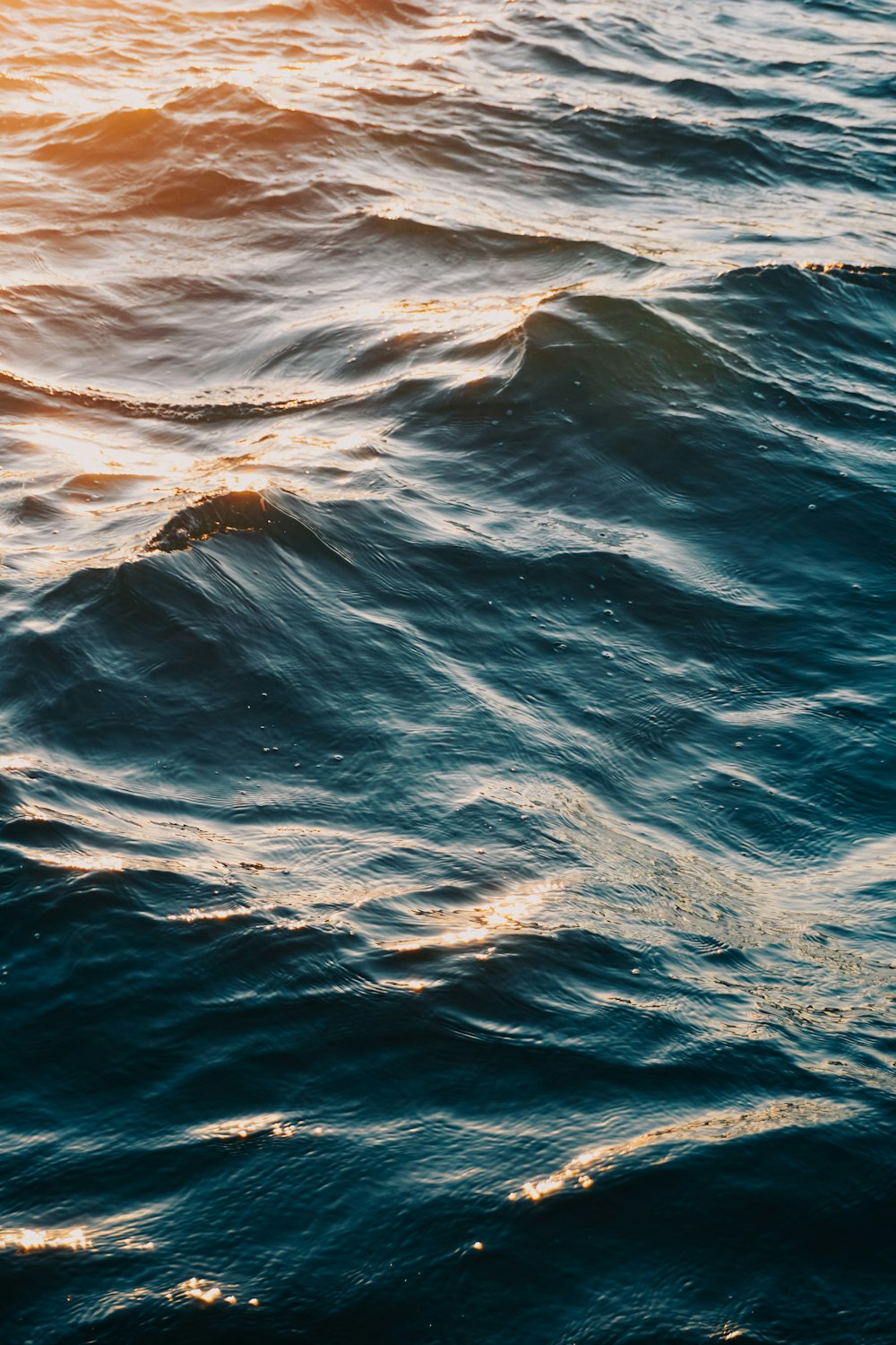 a large body of water with waves in it