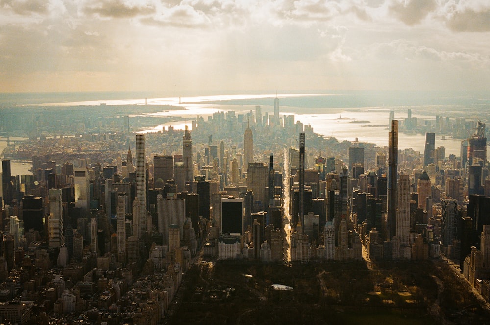 an aerial view of a large city with lots of tall buildings