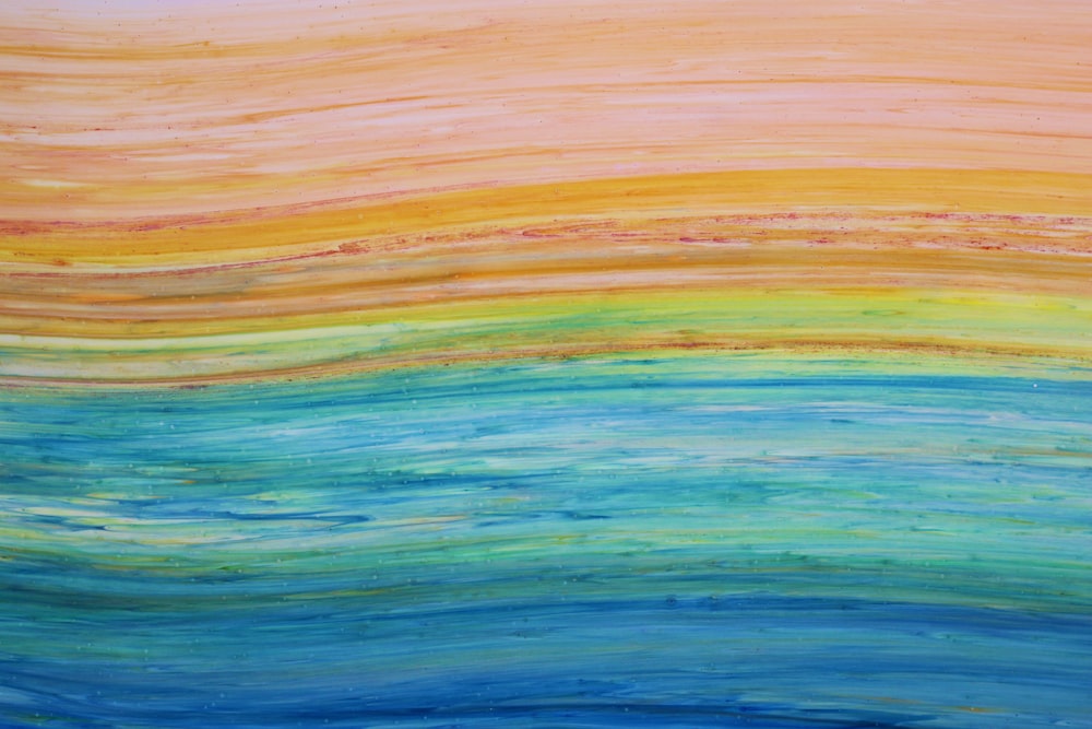 a painting of a colorful ocean with waves